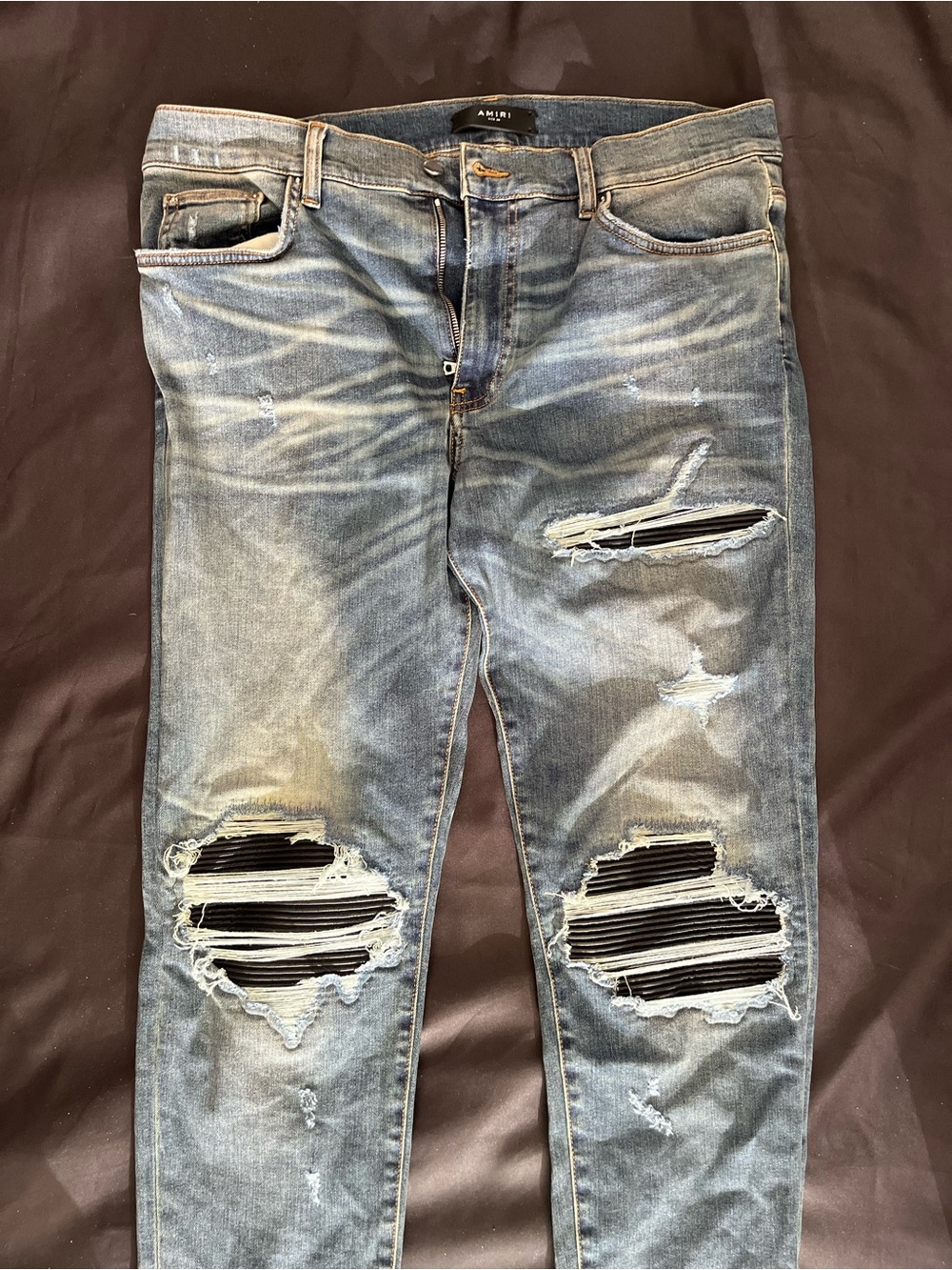 AMIRI Distressed Light Blue Skinny Jeans
